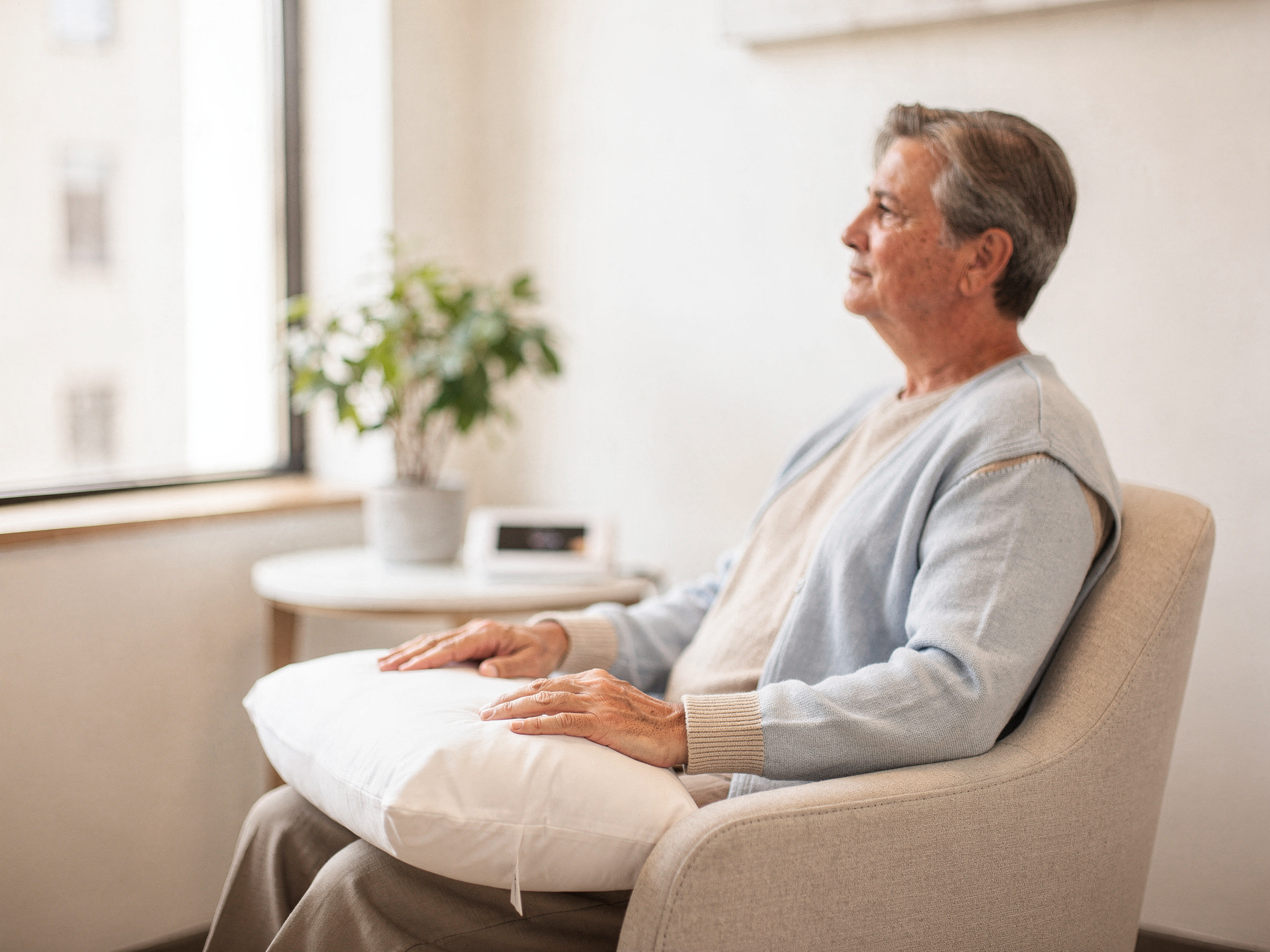 Middle-aged man sitting in a consultation room at Texas Sinus and Snoring's Spring office